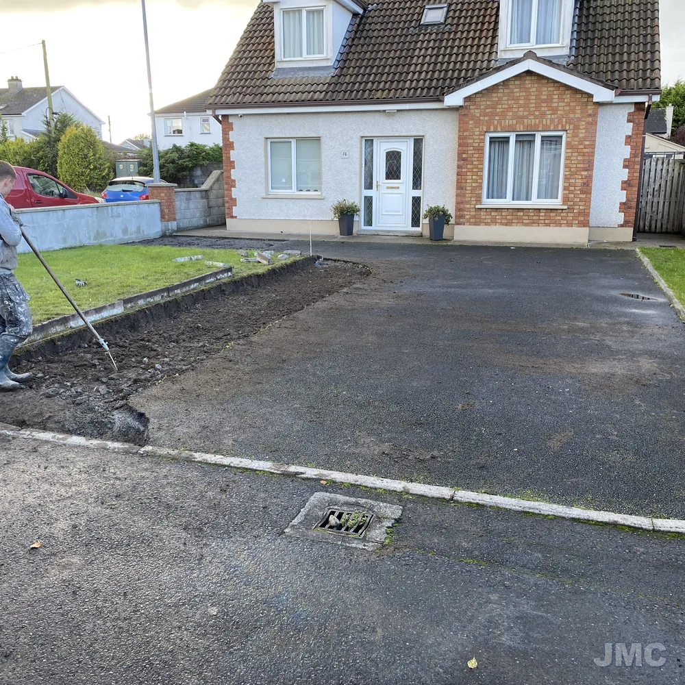 James McCarthy jet washing a tarmac drive